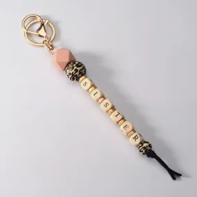 PINK LEOPARD BEADED SISTER KEYCHAIN